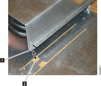 Rear enclosure tab and sheetmetal tray slot