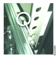 Management enclosure rail rear release